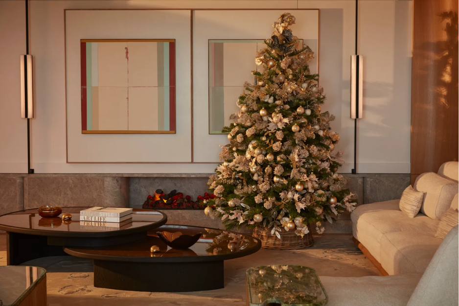 Festive garlands and a chic lobby at The Emory Belgravia, a serene choice among luxury London Christmas Hotels.