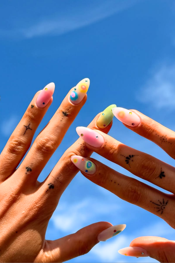 colorful manicure against the sky festival nail ideas